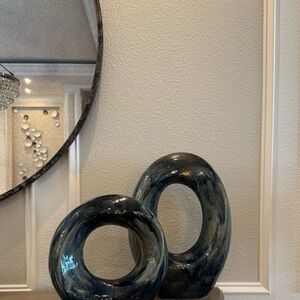 Elegant Blue Glass Ring Sculptures